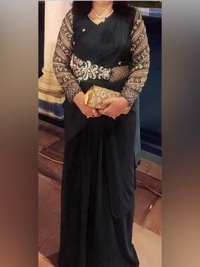 Embellished dark green Saree with Gold embroidery